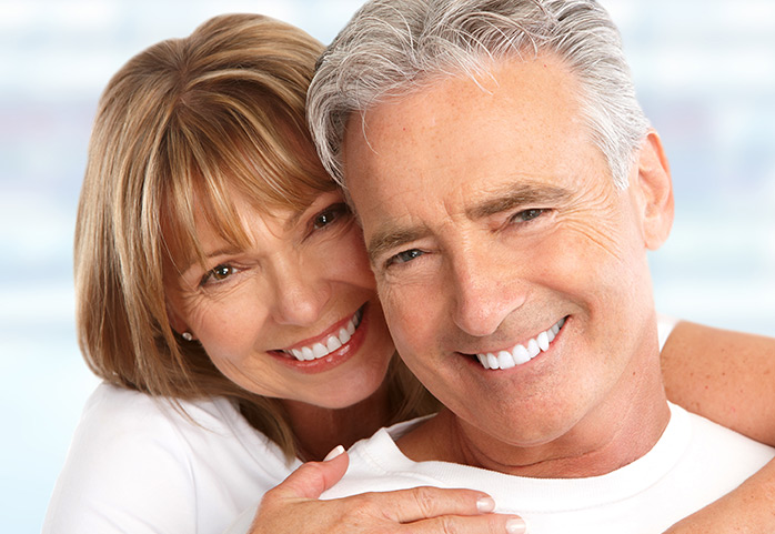 happy couple after dental implants in philadelphia pa area